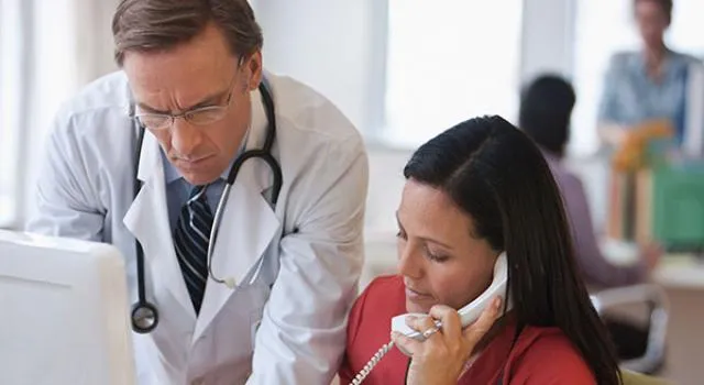Medical professionals consulting