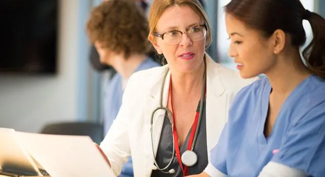 Medical professionals consulting